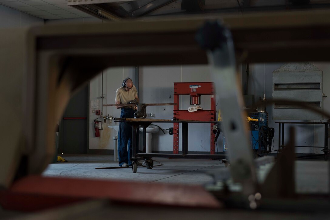 U.S. Air Force Staff Sgt. Ronald Bender, 39th Maintenance Squadron metals technology craftsman, cuts a piece of tubing May 30, 2017, at Incirlik Air Base, Turkey. The metals technology shop is capable of repairing and in some cases, creating parts that are no longer in production. (U.S. Air Force photo by Airman 1st Class Devin M. Rumbaugh)
