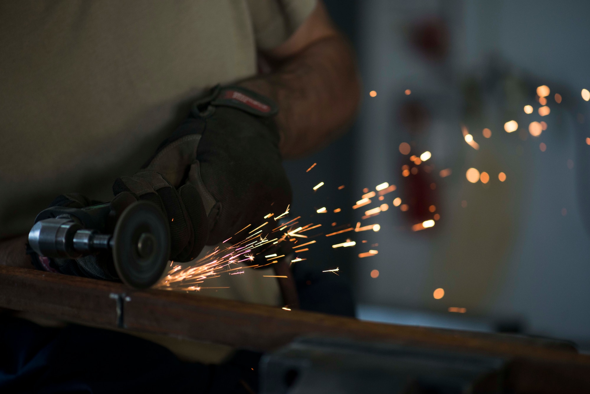 U.S. Air Force Staff Sgt. Ronald Bender, 39th Maintenance Squadron metals technology craftsman, cuts a piece of metal May 30, 2017, at Incirlik Air Base, Turkey. The metals technology shop is capable of repairing and in some cases, creating parts that are no longer in production. (U.S. Air Force photo by Airman 1st Class Devin M. Rumbaugh)