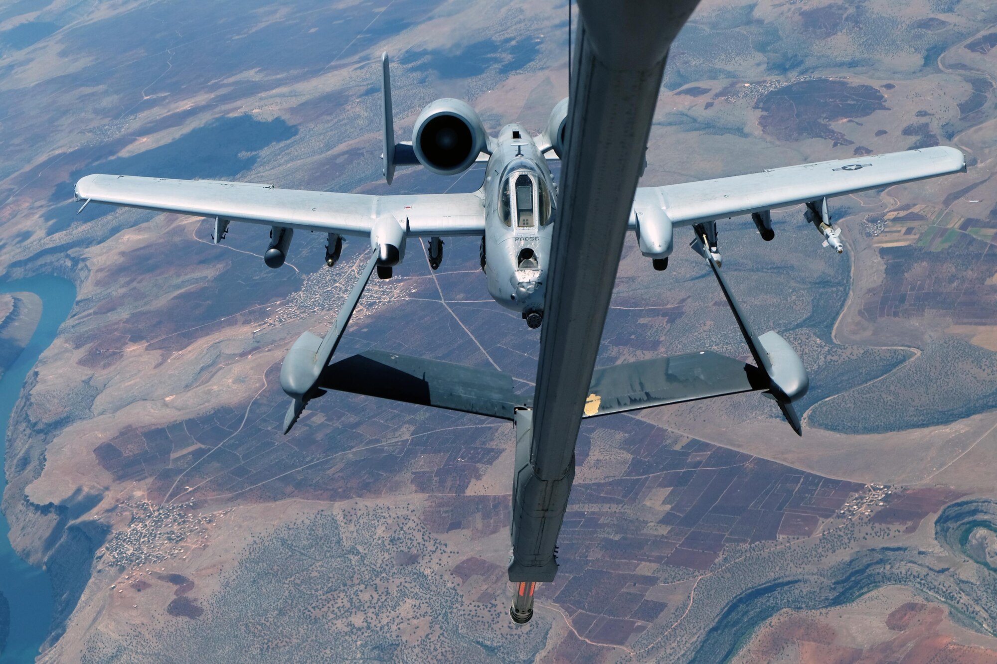 An A-10 Thunderbolt II prepares to receive fuel from a 908th Expeditionary Air Refueling Squadron KC-10 Extender May 31, 2017, over an undisclosed location in southwest Asia. The Thunderbolt II can employ a wide variety of conventional munitions and the GAU-8/A 30mm cannon, capable of firing 3,900 rounds per minute to defeat a wide variety of targets including tanks. (U.S. Air Force photo by Senior Airman Preston Webb)
