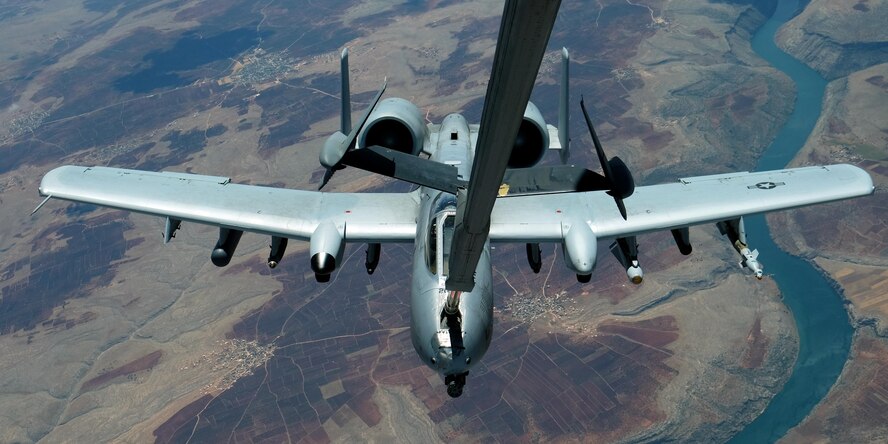 An A-10 Thunderbolt II receives fuel from a 908th Expeditionary Air Refueling Squadron KC-10 Extender May 31, 2017, over an undisclosed location in southwest Asia. The Thunderbolt II can employ a wide variety of conventional munitions and the GAU-8/A 30mm cannon, capable of firing 3,900 rounds per minute to defeat a wide variety of targets including tanks. (U.S. Air Force photo by Senior Airman Preston Webb)