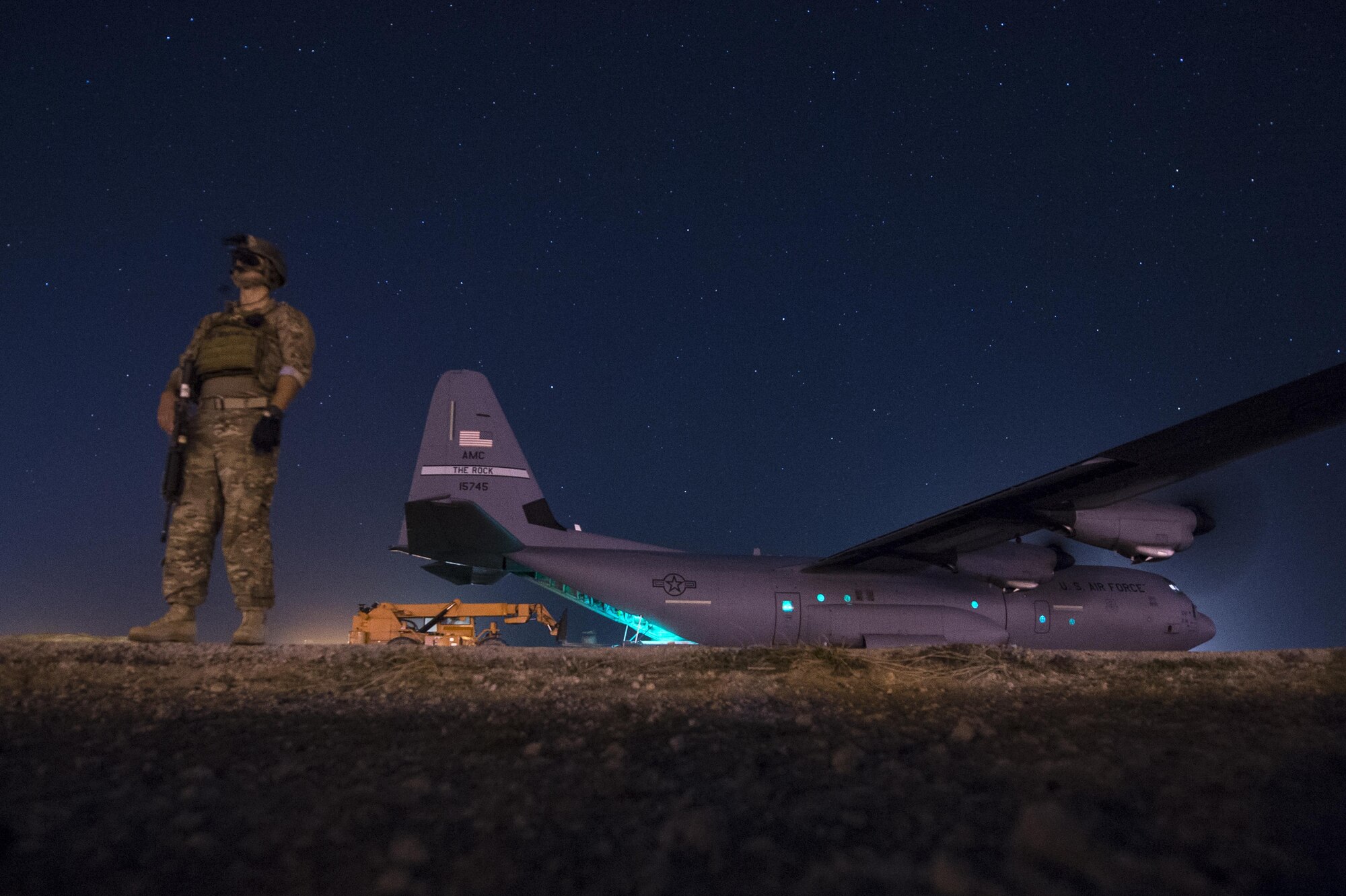 A fly away security team from the 1st Battalion, 153rd Infantry Regiment provides security for a C-130J May 26, 2017, during a cargo mission in Somalia, supporting the Combined Joint Task Force-Horn of Africa. CJTF-HOA promotes prosperity and security in East Africa by assisting partner nations with countering violent extremist organizations, fostering regional security cooperation, and by protecting U.S. personnel and facilities in its 10-country area of responsibility. (U.S. Air Force photo/Master Sgt. Russ Scalf)