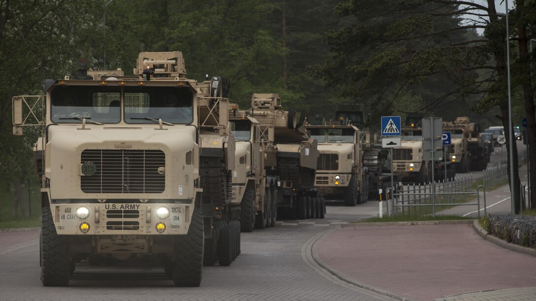 VENTSPILS, Latvia- NATO nations participate in convoy operations alongside Marines while escorted by Latvian Movement and Control officers during exercise Saber Strike 17 in Ventspils, Latvia, May 28, 2017. Exercise Saber Strike 17 is an annual combined-joint exercise conducted at various locations throughout the Baltic region and Poland. The combined training prepares allies and partners to respond more to regional crises and meet their own security needs by improving the security of borders and countering threats. 