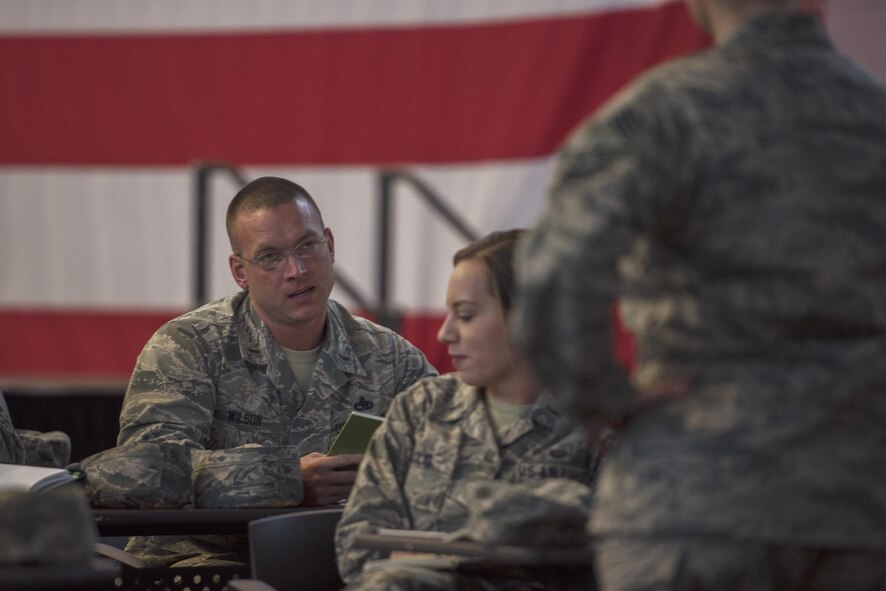 2nd Lt. Micah Wilson, 23d Component Maintenance Squadron propulsion flight officer in charge, talks about changing perspectives to improve work dynamics during a group activity as part of the Profession of Arms Center of Excellence visit, May 19, 2017, at Moody Air Force Base, Ga. PACE encourages Airmen to commit to the mindset, character and core values required to succeed today and well into the future. During the visit, Smith challenged Moody Airmen to successfully change their perspectives to find solutions to old problems as leaders. (U.S. Air Force photo by Senior Airman Greg Nash)
