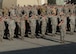 380th Air Expeditionary Wing Airmen salute the U.S. flag as it is lowered during a monthly retreat ceremony June 2, 2017, at an undisclosed location in southwest Asia. Retreat is a long-standing tradition honoring the flag and signaling the end of the duty day. (U.S. Air Force photo by Senior Airman Preston Webb)