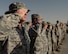 380th Air Expeditionary Wing Airmen salute the U.S. flag as it is lowered during a monthly retreat ceremony June 2, 2017, at an undisclosed location in southwest Asia. Retreat is a long-standing tradition honoring the flag and signaling the end of the duty day. (U.S. Air Force photo by Senior Airman Preston Webb)
