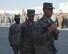 380th Air Expeditionary Wing honor guardsman retire the U.S. flag during a monthly retreat ceremony June 2, 2017, at an undisclosed location in southwest Asia. A retreat ceremony, in which the U.S. flag is retired, takes place here on the first Friday of every month. (U.S. Air Force photo by Senior Airman Preston Webb)