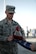 A 380th Air Expeditionary Wing honor guardsman folds the U.S. flag during a monthly retreat ceremony June 2, 2017, at an undisclosed location in southwest Asia. A retreat ceremony, in which the U.S. flag is retired, takes place here on the first Friday of every month. (U.S. Air Force photo by Senior Airman Preston Webb)