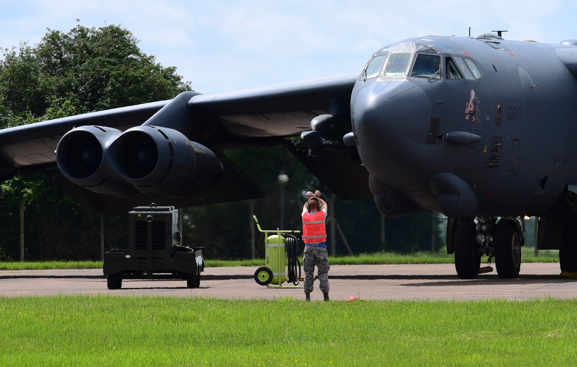 U.S. Air Force Senior Airman Calvin Kunkel, 2nd Aircraft Maintenance Squadron assistant dedicated crew chief, marshals a B-52H Stratofortress from Barksdale Air Force Base, La., at RAF Fairford, U.K., June 1, 2017. Approximately 800 Striker Airmen from Air Force Global Strike Command are participating in joint and combined exercises in the European theatre with 14 allied and partner nations enhancing the Air Force’s interoperability and resiliency with allied nations. (U.S. Air Force photo by Airman 1st Class Randahl J. Jenson)