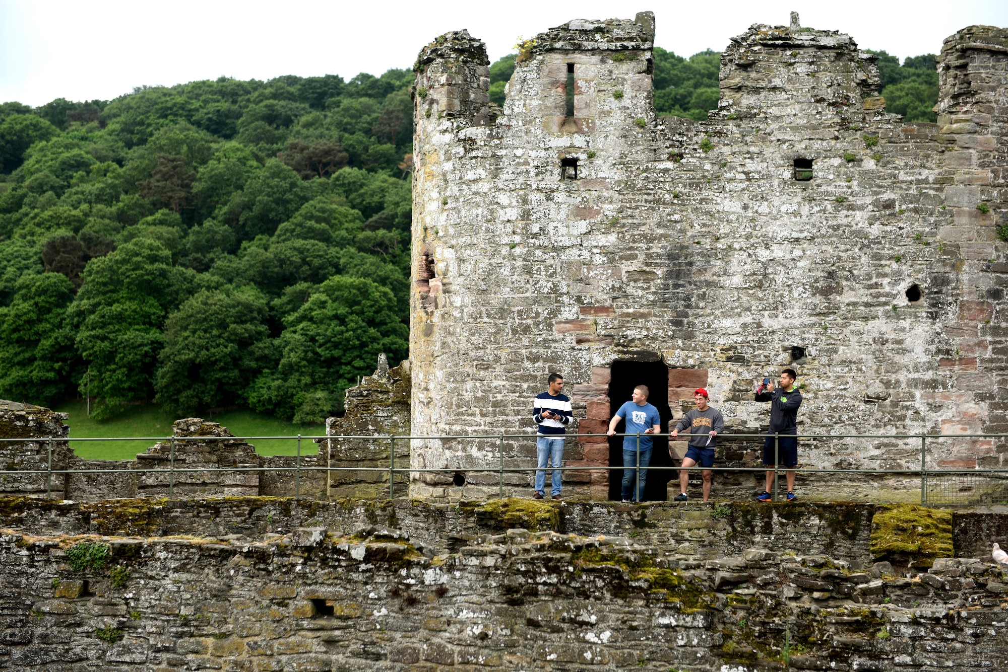 U.S. Air Force Airmen from Royal Air Force Lakenheath, England explore the remains of Castle Conwy during a chapel-sponsored resiliency trip to Conwy Castle in Conwy, Wales, May 28. The trip was for first-term single Airmen to work toward resiliency goals and to build friendships with other Airmen. (U.S. Air Force photo by Airman 1st Class John A. Crawford)