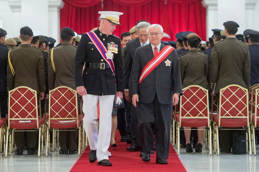 Marine Corps Gen. Joe Dunford, chairman of the Joint Chiefs of Staff, speaks with Singapore President Tony Tan Keng Yam after receiving an award at the Istana, Singapore, June 2, 2017. Dunford is in Singapore to attend the Shangri-La Dialogue, an Asia-focused defense summit. DoD photo by Navy Petty Officer 2nd Class Dominique A. Pineiro