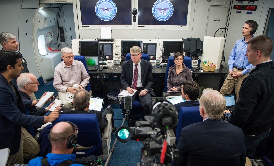 David F. Helvey, performing the duties of the assistant secretary of defense for Asian and Pacific security affairs, briefs reporters on Defense Secretary Jim Mattis' overseas trip while en route to Singapore aboard a military aircraft, June 1, 2017. DoD photo by Air Force Staff Sgt. Jette Carr