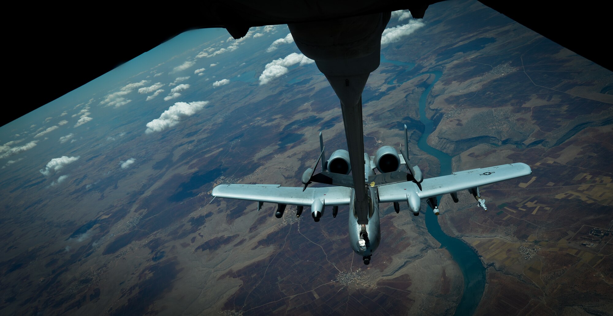 A U.S. Air Force A-10 Thunderbolt II  receives fuel from a 908th Expeditionary Air Refueling Squadron KC-10 Extender during a flight in support of Operation Inherent Resolve May 31, 2017.The aircraft can loiter near battle areas for extended periods of time and operate in low ceiling and visibility conditions. The wide combat radius and short takeoff and landing capability permit operations in and out of locations near front lines. (U.S. Air Force photo by Staff Sgt. Michael Battles)