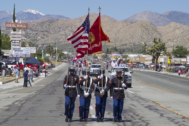 The Combat Center Color Guard leads the parade during the 67th annual Grubstake Days Parade along California Highway 62 in Yucca Valley, Calif., May 27, 2017. The town holds the annual Grubstake Days festival to commemorate the mining heritage of the Yucca Valley community. (U.S. Marine Corps photo by Sgt. Connor Hancock)