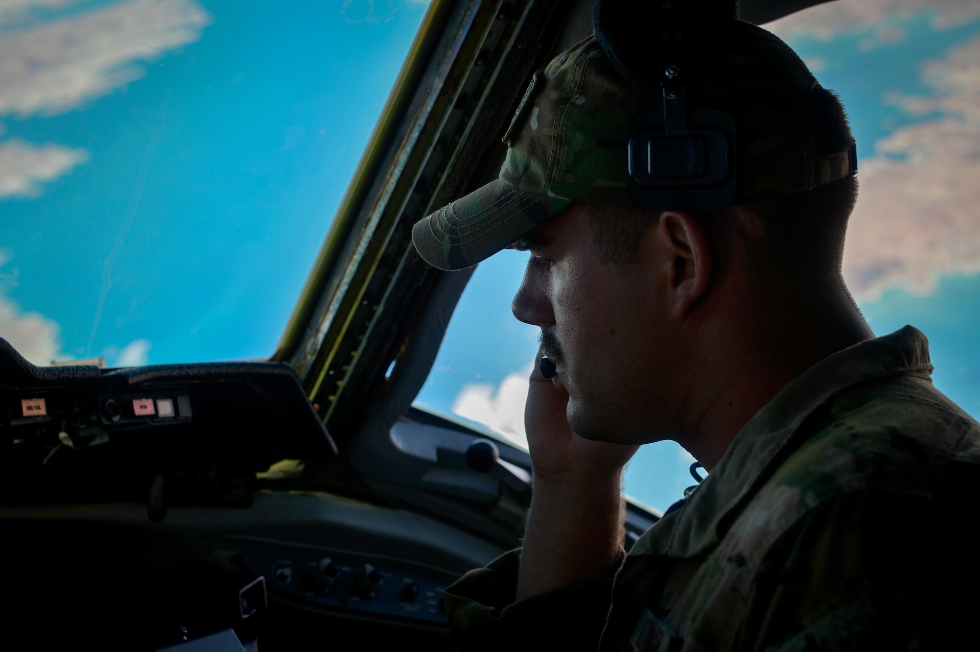 A 908th Expeditionary Air Refueling Squadron KC-10 Extender pilot speaks with the crew during a flight in support of Operation Inherent Resolve May 31, 2017. The KC-10 is an Air Mobility Command advanced tanker and cargo aircraft designed to provide increased global mobility for U.S. Armed Forces. The KC-10's primary mission is aerial refueling; it can combine the tasks of a tanker and cargo aircraft by refueling fighters and simultaneously carry the fighter support personnel and equipment on overseas deployments. (U.S. Air Force photo by Staff Sgt. Michael Battles)