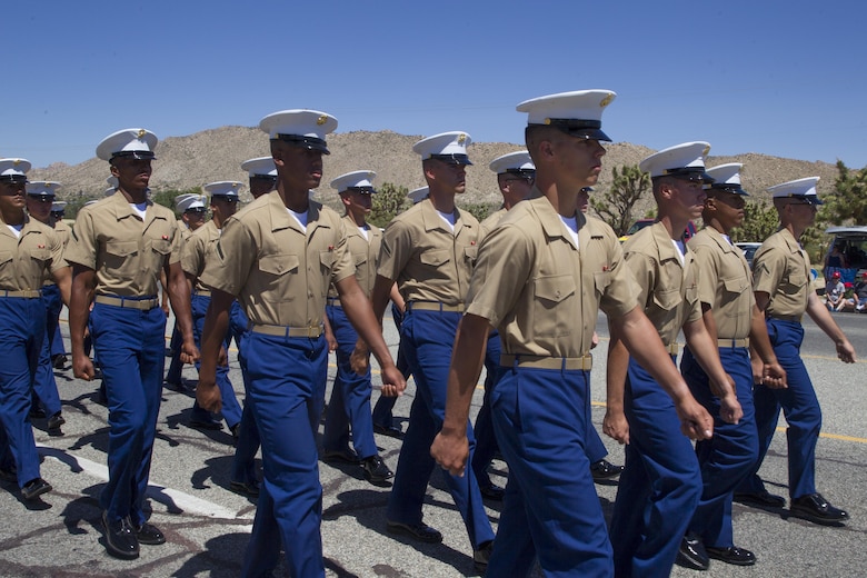 Marines with Marine Corps Communication-Electronics School march during the 67th annual Grubstake Days Parade along California Highway 62 in Yucca Valley, Calif., May 27, 2017. The town holds the annual Grubstake Days festival to embrace the mining heritage of the Yucca Valley community. (U.S. Marine Corps photo by Sgt. Connor Hancock)