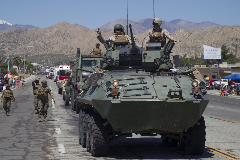 Marines with 3rd Light Armored Reconnaissance Battalion participate in the 67th annual Grubstake Days Parade along California Highway 62 in Yucca Valley, Calif., May 27, 2017. The town holds the annual Grubstake Days festival to commemorate the mining heritage of the Yucca Valley community. (U.S. Marine Corps photo by Sgt. Connor Hancock)