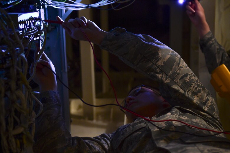 Senior Airman Eric Dahl, 460th Space Communications Squadron satellite communication technician, operates on an antenna March 15, 2017, on Buckley Air Force Base, Colo. SATCOM Airmen provide guaranteed communication, maintenance and efficiency between the satellites in space and their end-users. (U.S. Air Force photo by Airman Jacob Deatherage/Released)