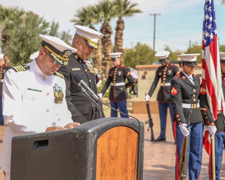 U.S. Navy Capt. Stephen Lee, Director of Religious Ministries at the Marine Corps Air Ground Combat Center, Twentynine Palms, Calif., gives the invocation at a Memorial Day event at the Twentynine Palms cemetery, Twentynine Palms, Calif., May 29, 2017. The annual event was held to honor America's fallen servicemembers.