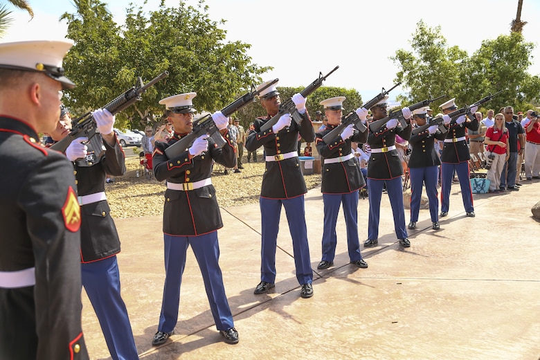 Marines from Headquarters Battalion, Marine Corps Air Ground Combat Center, Twentynine Palms, Calif., execute a rifle salute during a Memorial Day service at the Twentynine Palms cemetery, Twentynine Palms, Ca., May 30, 2017. The annual service was held to honor America's fallen servicemembers.