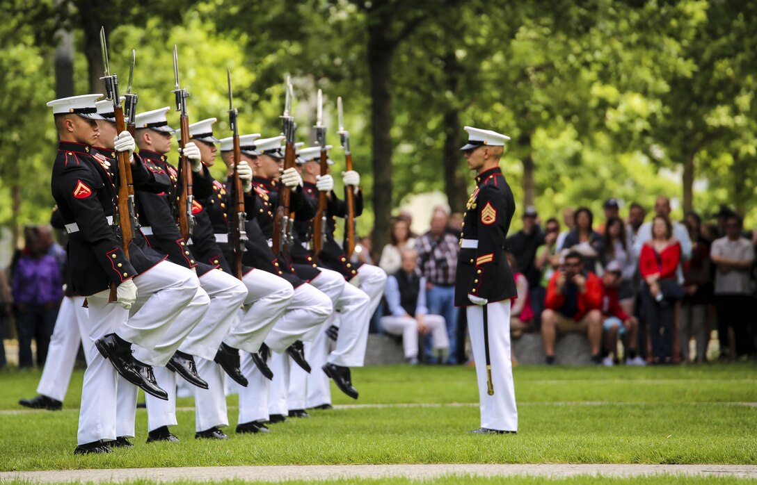 Marines with the U.S. Marine Corps Silent Drill Platoon execute precision drill movements during a performance at the 9/11 Memorial Plaza as part of the New York Fleet Week 2017 tour, May 28, 2017. The BCD is comprised of the Marine Corps Silent Drill Platoon, “The Commandant’s Own,” the U.S. Marine Drum & Bugle Corps, and the Marine Corps Color Guard. The Marines of this highly skilled unit traveled to New York to demonstrate the discipline, professionalism, and “Esprit de Corps” of Marines. (Official U.S. Marine Corps photo by Lance Cpl. Damon Mclean/Released)