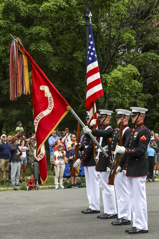The U.S. Marine Corps Color Guard renders honors to the National Anthem during a performance as part of the New York Fleet Week 2017 tour at Prospect Park in Brooklyn, N.Y., May 27, 2017. The BCD is comprised of the Marine Corps Silent Drill Platoon, “The Commandant’s Own,” the U.S. Marine Drum & Bugle Corps, and the Marine Corps Color Guard. The Marines of this highly skilled unit traveled to N.Y. to demonstrate the discipline, professionalism, and “Esprit de Corps” of Marines. (Official U.S. Marine Corps photo by Lance Cpl. Damon Mclean/Released)