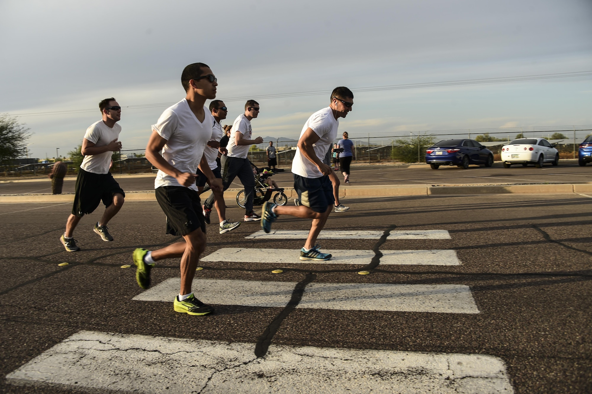 Runners participating in the LGBT Pride Month 5k color run begin the 3.1-mile run June 1, 2017 at Luke Air Force Base, Ariz. The run was open to any current or past service members. (U.S. Air Force photo by Airman 1st Class Caleb Worpel)