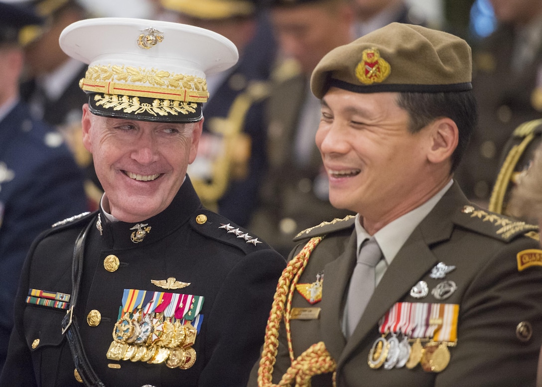 Marine Corps Gen. Joe Dunford, the chairman of the Joint Chiefs of Staff, speaks with Singaporean chief of staff, Army Lt. Gen. Perry Lim Cheng Yeow, before a medal ceremony at Singapore’s presidential residence in Newton, Singapore, June 2, 2017. DoD photo by Navy Petty Officer 2nd Class Dominique A. Pineiro