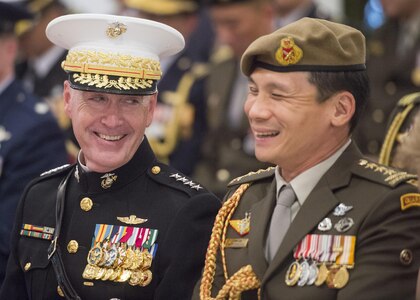 Marine Corps Gen. Joseph F. Dunford Jr., chairman of the Joint Chiefs of Staff, recieves an award from the President of Singapore Tony Tan at the Istana, June 2, 2017. Dunford is in Singapore to attend the Shangri-La Dialogue, an Asia-focused defense summit, where he will meet with regional allies and counterparts to discuss common security issues. 