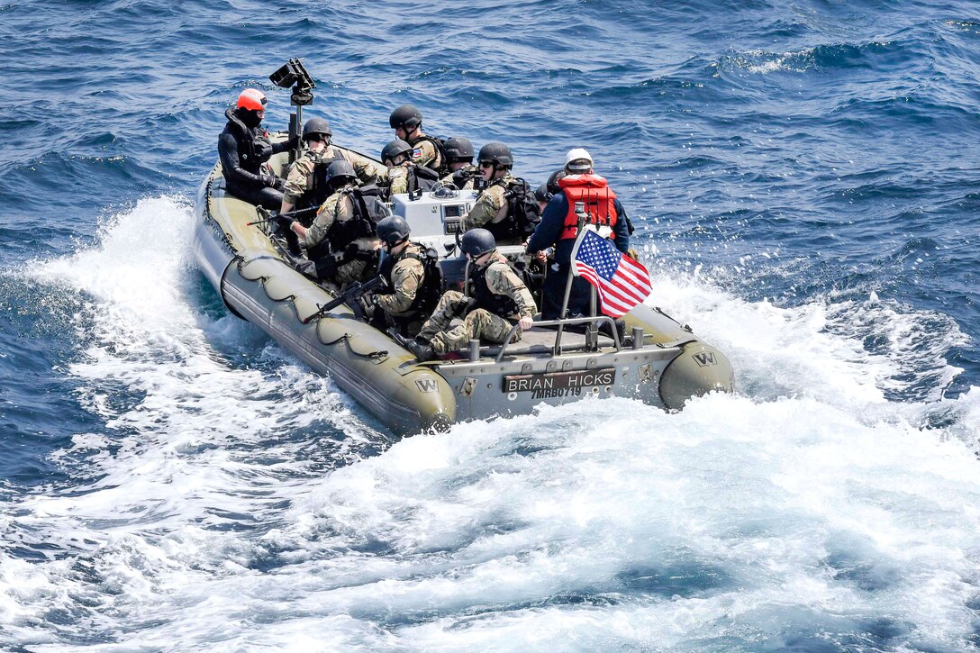 U.S. sailors ride in a rigid-hull inflatable boat from the USS Wayne E. Meyer during visit, board, search and seizure training in the western Pacific Ocean, May 22, 2017. Navy photo by Petty Officer 3rd Class Kelsey L. Adams