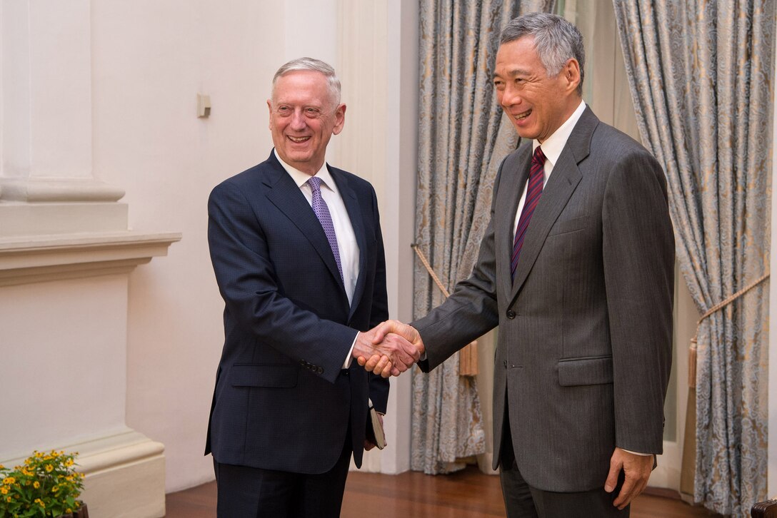 Defense Secretary Jim Mattis greets Singapore's Prime Minister Lee Hsien Loong at the Istana in Singapore, June 2, 2017. DoD photo by Air Force Staff Sgt. Jette Carr