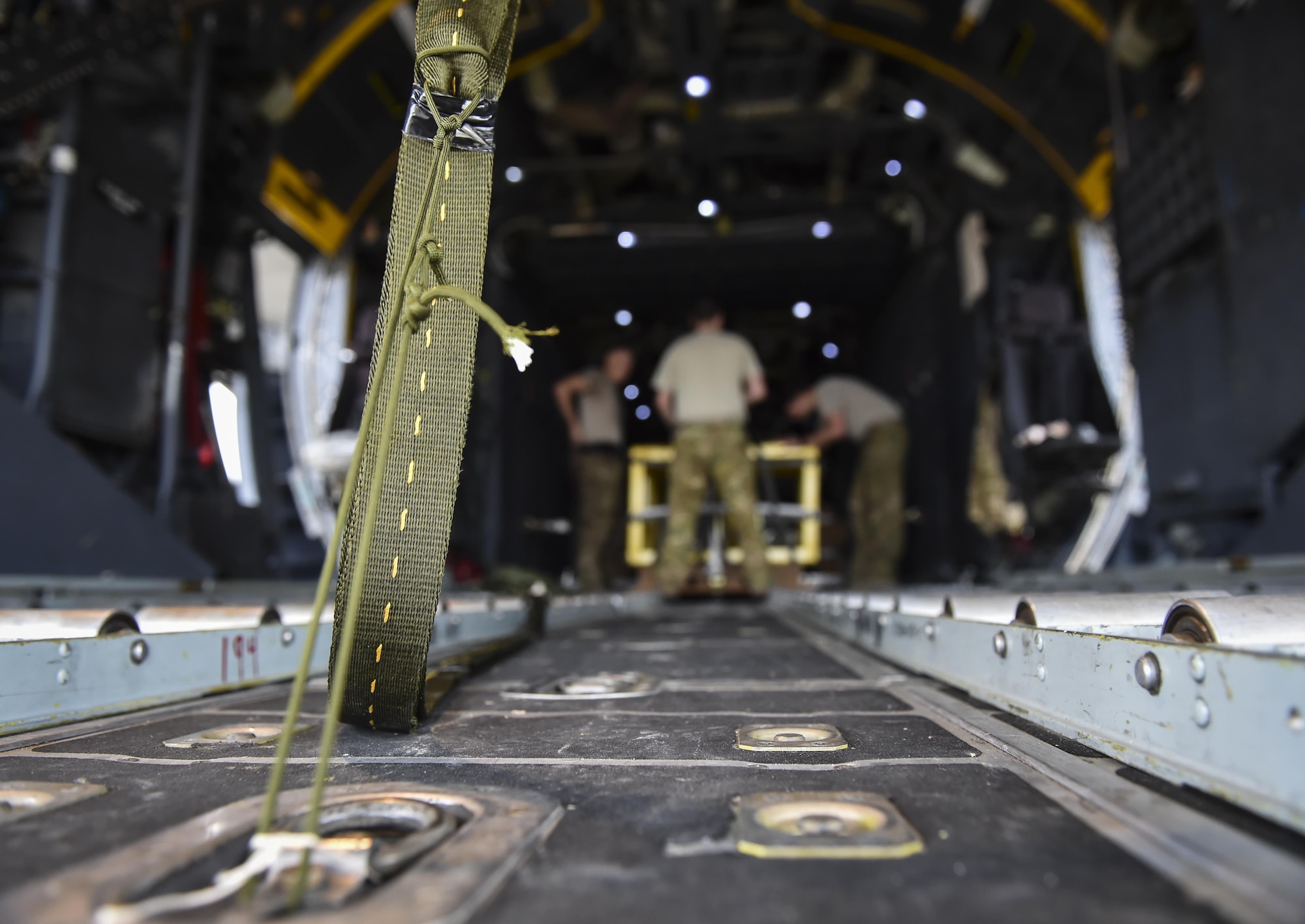 A heavy equipment extract parachute line is secured to an MC-130H Combat Talon II at Hurlburt Field, Fla., May 30, 2017. After an extract parachute is deployed, the wind force pulls cargo off the ramp of aircraft. (U.S. Air Force photo by Airman 1st Class Joseph Pick)