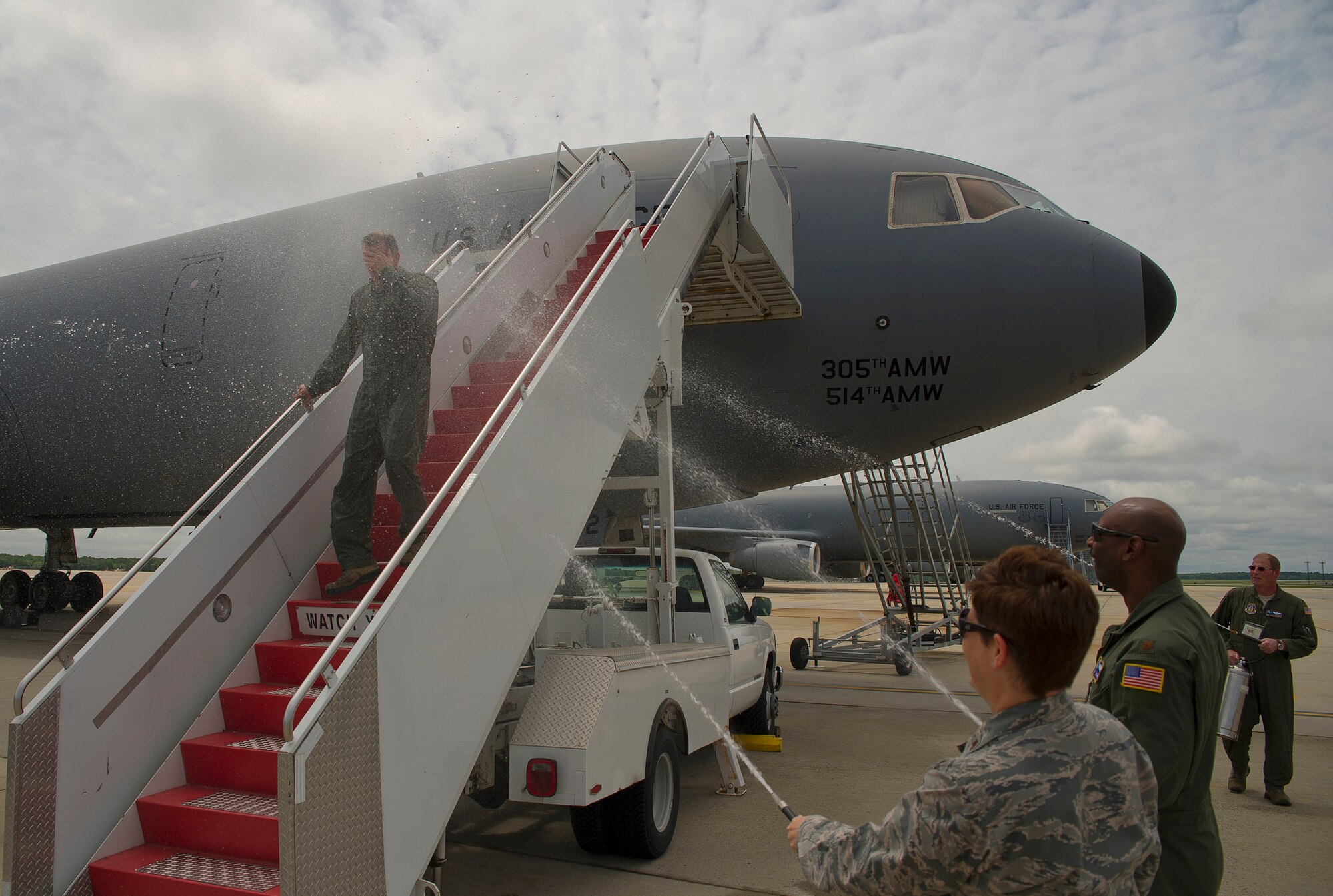 Col. Robert Dunham, 514th Operations Group commander, flew his "fini" flight on a KC-10 Extender, May 31. Dunham, who has been with the 514th Air Mobility Wing since 1999, is retiring from duty after almost 30 years of service with the Air Force and Air Force Reserve. The "Fini" flight is a time honored tradition marking the retirement of a pilot through a final flight. After landing the pilot is often sprayed, or doused with water and champagne by friends, family, and crew to celebrate his completion.