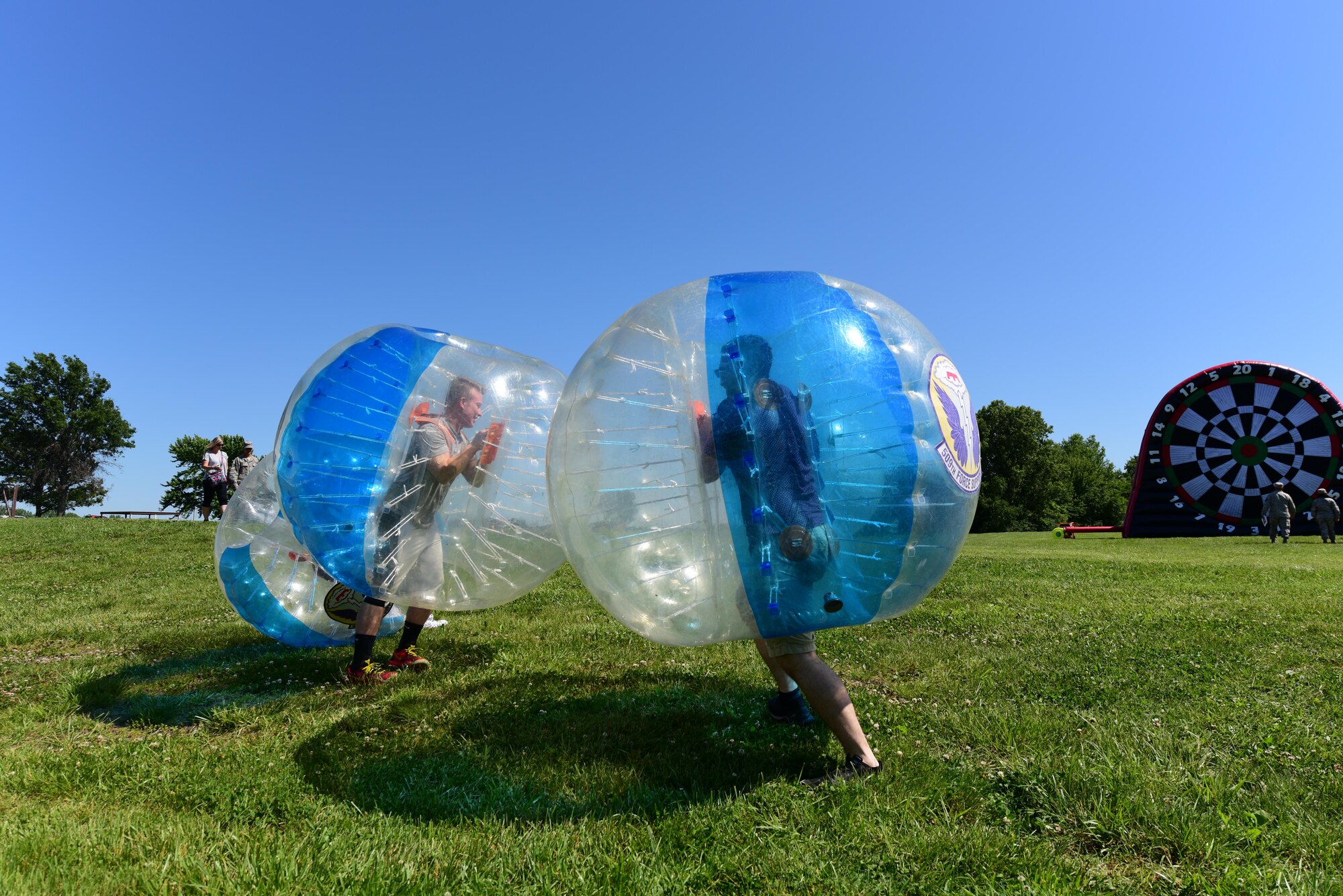 Members of Team Whiteman attend a deployment party at Ike Skelton Park at Whiteman Air Force Base, Mo., May 25, 2017, as part of the Air Force Global Strike Command Year of the Family initiative. The party celebrated Airmen who have recently returned, as well as those leaving soon with prizes, games, face painting and more. (U.S. Air Force photo by Airman Michaela R. Slanchik)