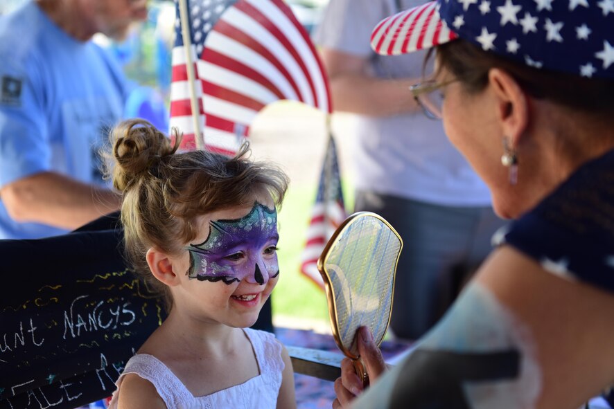 Members of Team Whiteman attend a deployment party at Ike Skelton Park at Whiteman Air Force Base, Mo., May 25, 2017, as part of the Air Force Global Strike Command Year of the Family initiative. The party celebrated Airmen who have recently returned, as well as those leaving soon with prizes, games, face painting and more. (U.S. Air Force photo by Airman Michaela R. Slanchik)