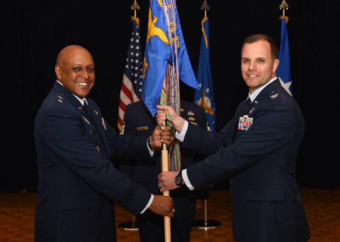 Col. David Kelley accepts the 576th Flight Test Squadron flag from Maj. Gen. Anthony Cotton, 20th Air Force commander, during a change-of-command ceremony at Vandenberg Air Force Base, Calif., June 1, 2017. In support of the 'deter and assure' mission, the 576th FLTS determines the effectiveness and accuracy of the ICBM force by planning, preparing and conducting ICBM ground and flight tests. (U.S. Air Force photo)