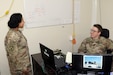 U.S. Army Sgt. 1st Class Suri Morales (left), preventive medical detachment sergeant and U.S. Army Capt. Samuel VanGordon, biochemists officer-in-charge, both soldiers with the 485th Preventive Medicine Detachment, discuss the daily battle rhythm, May 26, at Camp Arifijan, Kuwait. The 485th Preventive Medicine Detachment mission is to mitigate disease and non-battle injuries for uniformed Servicemembers, U.S. Department of Defense civilians and contractors deployed in the U.S. Central Command area of responsibility.