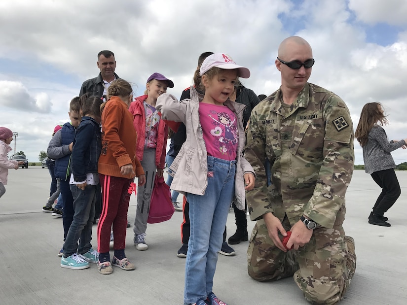 Staff Sgt. Sean McCarty participates in Romanian Youth Day at the Mihail Kogalniceanu Airbase, Romania as a Soldier of Resolute Castle, May 26, 2017. Resolute Castle 17 is an exercise strengthening the NATO alliance and enhancing its capacity for joint training and response to threats within the region.