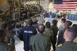 Tech. Sgt. Sean Preston, 433rd Maintenance Squadron aerospace propulsion technician, explains the capabilities of the F-138 jet engine used on the C-5M Super Galaxy aircraft to students of the Inter-American Air Force Academy June 1, 2017 at Joint Base San Antonio-Lackland, Texas. The students also visited the fabrication and sheet metal  shop.  (U.S. Air Force photo by Benjamin Faske)