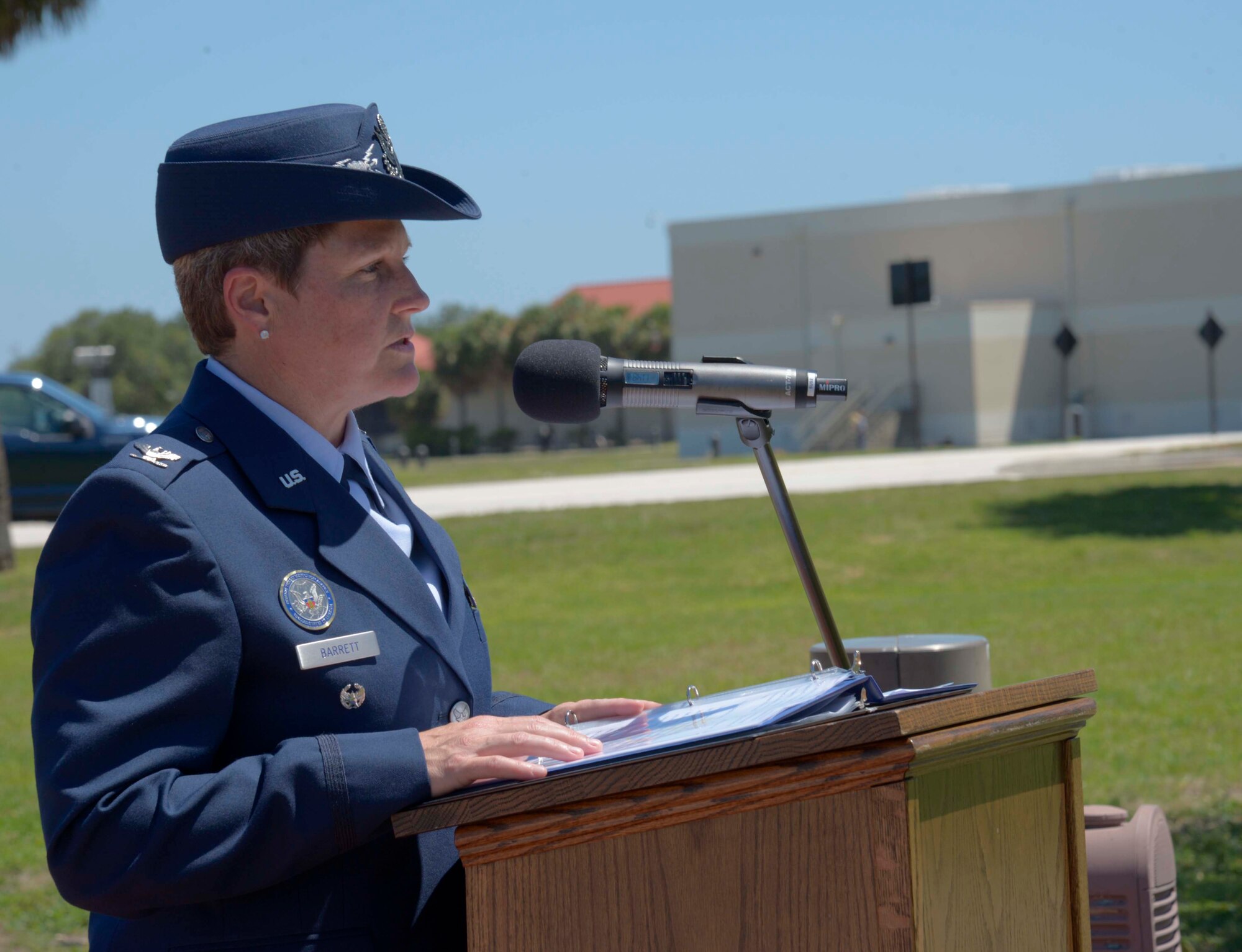 U.S. Air Force Col. Jennifer Barrett, vice commander of the 6th Air Mobility Wing, provides remarks during a Memorial Day ceremony at MacDill Air Force Base, Fla., May 26, 2017. The event was held prior to pay respect to fallen heroes prior to the holiday weekend. (U.S. Air Force photo by Staff Sgt. Vernon L. Fowler Jr.)