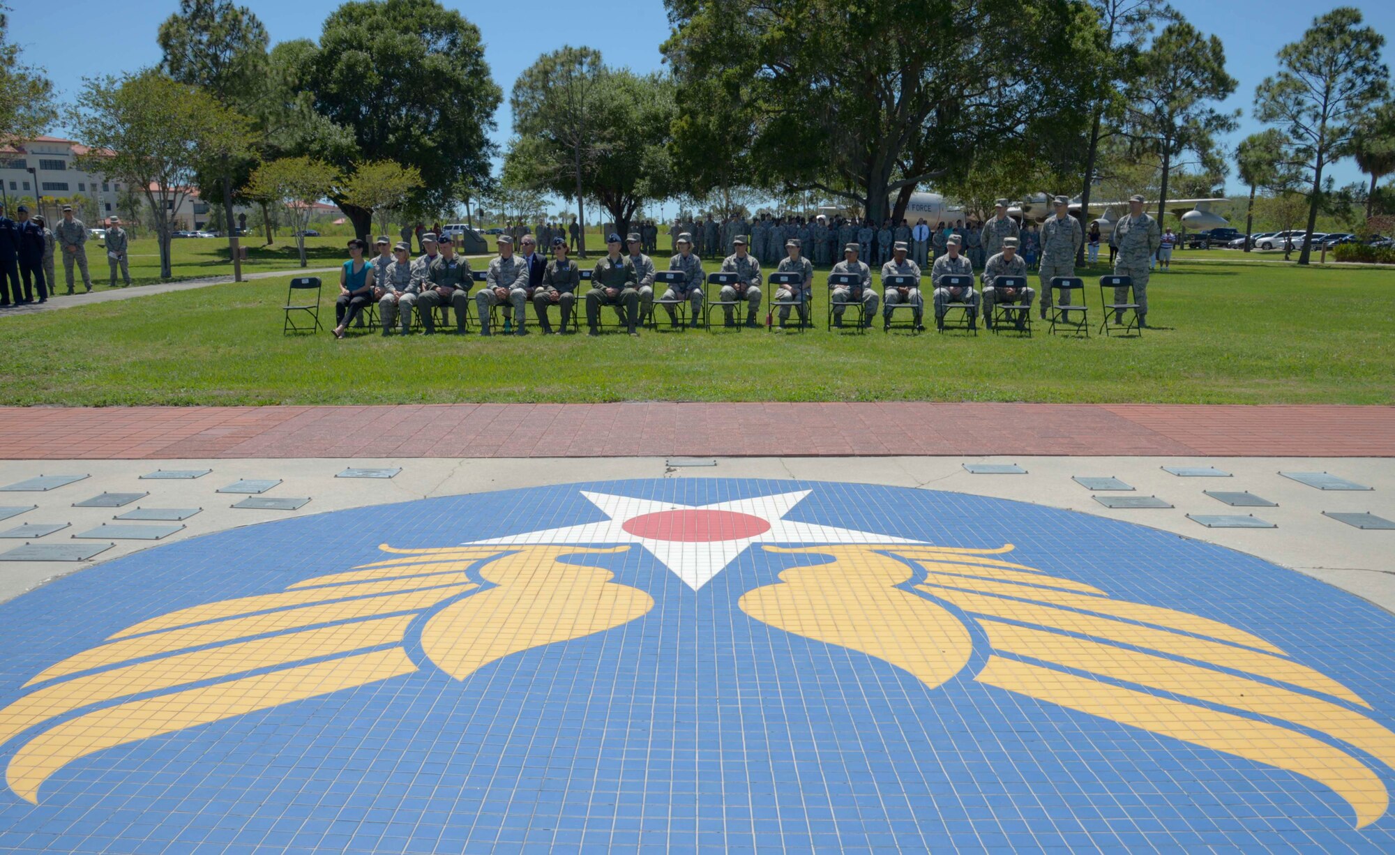 Members of the 6th Air Mobility Wing observe a Memorial Day ceremony at MacDill Air Force Base, Fla., May 26, 2017. Personnel and members of the community were invited to attend and pay respect to fallen heroes. (U.S. Air Force photo by Staff Sgt. Vernon L. Fowler Jr.)