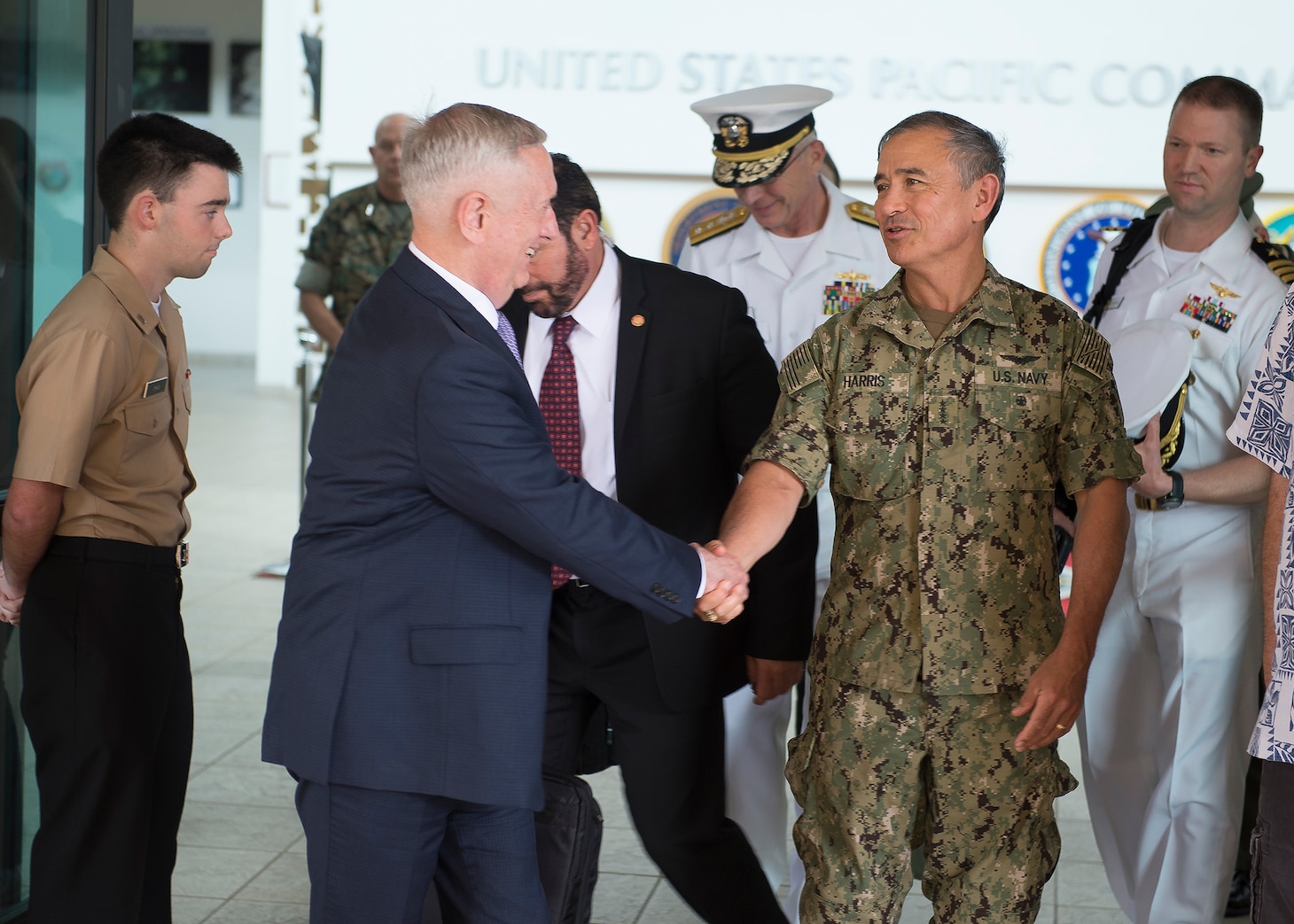 Secretary of Defense James Mattis shakes hands with Pacific Command (USPACOM) commander Adm. Harry Harris as he departs USPACOM headquarters, on the stop of an overseas trip, May 31, 2017. This is the first time Mattis has visited USPACOM headquarters since holding office as Secretary of Defense. During the meeting Mattis also met with USPACOM component commanders where they discussed challenges and opportunities in the Indo-Asia-Pacific region. 
