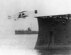 Eugene B. Ely takes off in a Curtis pusher aircraft from a platform built over the bow of the USS Birmingham, Nov. 14, 1910, Hampton Roads, Virginia. Ely demonstrated the concept that became the aircraft carrier. (Courtesy photo)