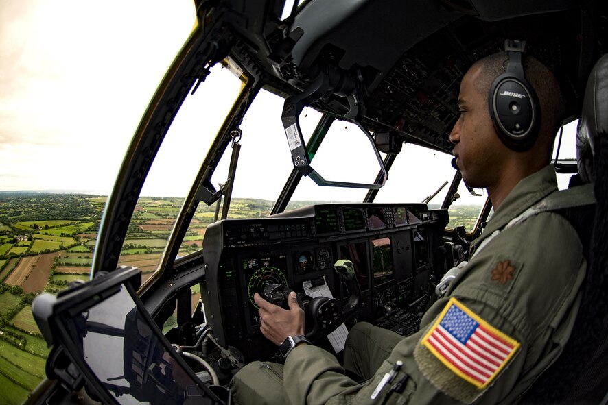 U.S. Air Force Maj. Chris Scott, 37th Airlift Squadron pilot, flies over Normandy, France, in a C-130J Super Hercules, May 30, 2017. Scott and his co-pilot practiced flying their route for the upcoming flyovers commemorating D-Day 73, the largest multinational amphibious landing and operational military airdrop in history, and highlights the U.S.’ steadfast commitment to European allies and partners.  (U.S. Air Force photo by Senior Airman Devin Boyer)