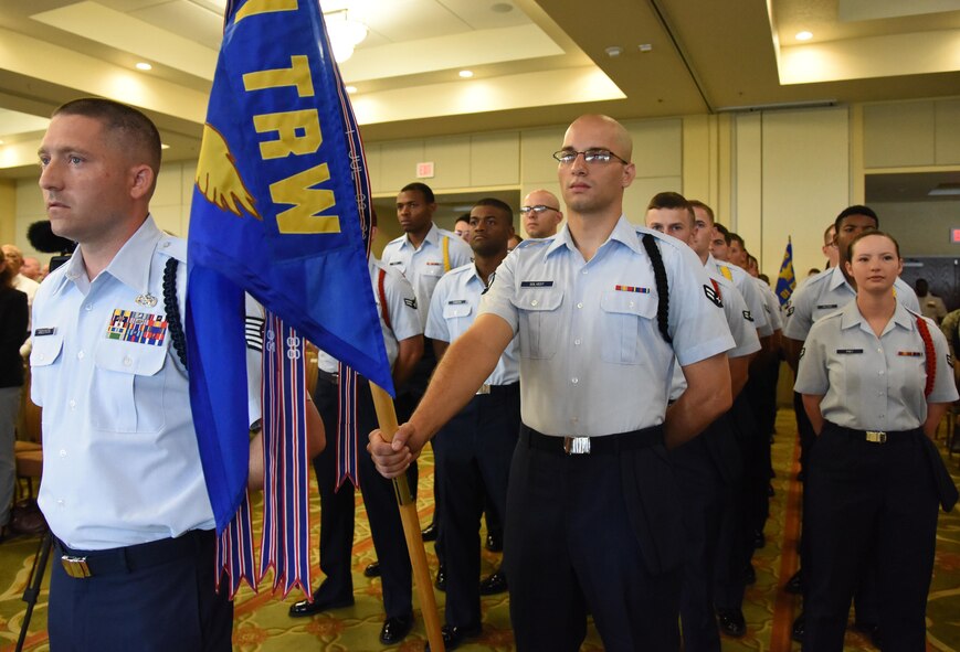 Airmen from the 81st Training Group stand in formation during the 81st Training Wing change of command ceremony at the Bay Breeze Event Center June 2, 2017, on Keesler Air Force Base, Miss. The ceremony is a symbol of command being exchanged from one commander to the next by the handing-off of a ceremonial guidon. (U.S. Air Force photo by Kemberly Groue)