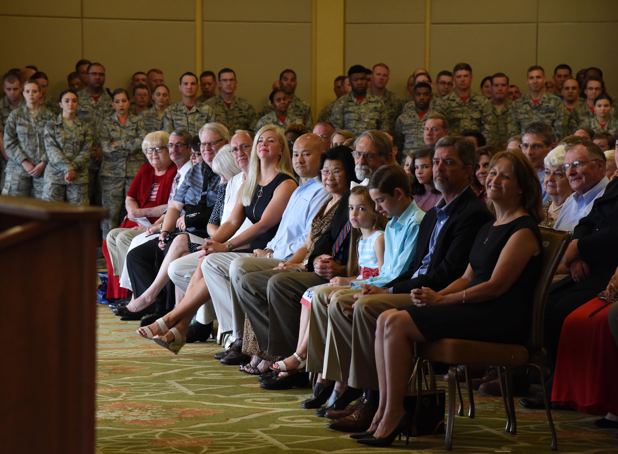 Keesler personnel, families and friends attend the 81st Training Wing change of command ceremony at the Bay Breeze Event Center June 2, 2017, on Keesler Air Force Base, Miss. The ceremony is a symbol of command being exchanged from one commander to the next by the handing-off of a ceremonial guidon. Col. Michele Edmondson passed on command of the 81st Training Wing to Col. Debra Lovette. (U.S. Air Force photo by Kemberly Groue) 