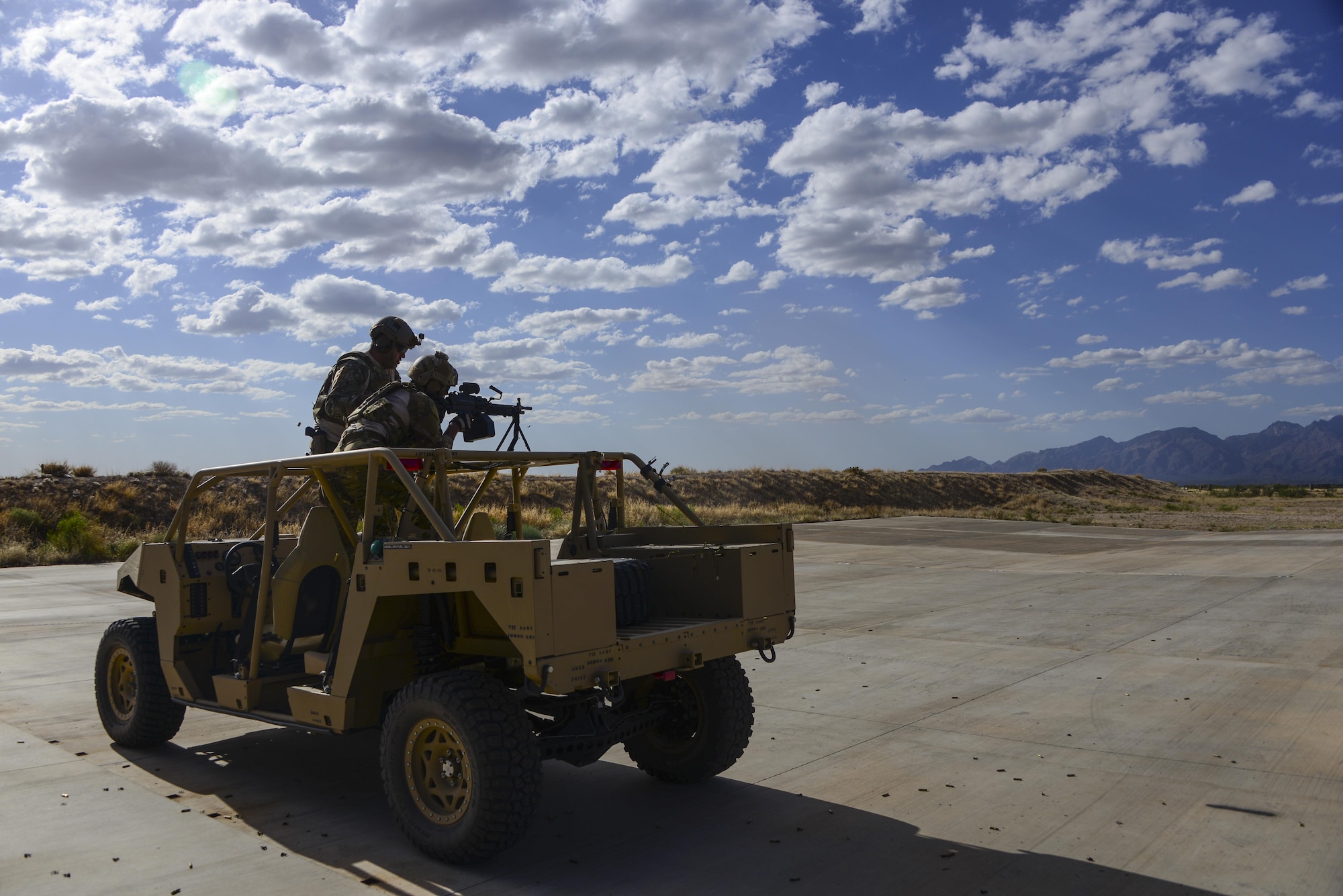 A U.S. Air Force pararescueman fires an M249 automatic rifle during the Guardian Angel Mission Qualification Training course at Davis-Monthan Air Force Base, Ariz., May 18, 2017. The MQT is a 90 day course that takes pararescuemen who have completed Air Education and Training Command schooling and helps them achieve their 5-level qualification. (U.S. Air Force photo by Airman 1st Class Nathan H. Barbour)