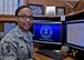 Master Sgt. Latonya J. June at her desk with the 117th Intelligence Squadron. June is the 2016 winner of the Alabama National Guard's Outstanding Woman of the Year award. (U.S. Air National Guard photo by: Airman 1st Class Lee Murphy)