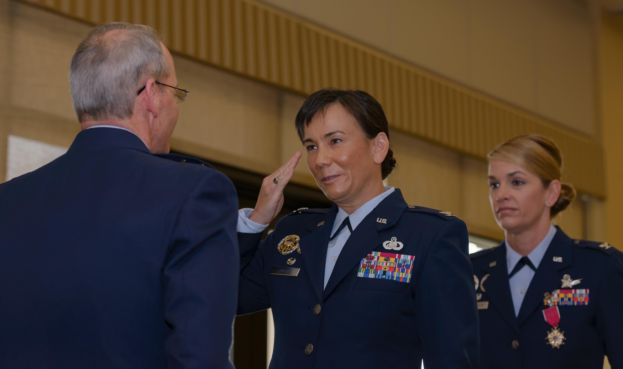 Col. Debra Lovette, 81st Training Wing commander, assumes command of the 81st TRW from Maj. Gen. Bob LaBrutta, 2nd Air Force commander, during a change of command ceremony at the Bay Breeze Event Center June 2, 2017, on Keesler Air Force Base, Miss. The ceremony is a symbol of command being exchanged from one commander to the next. Lovette assumed command of the 81st TRW from Col. Michele Edmondson. (U.S. Air Force photo by André Askew)