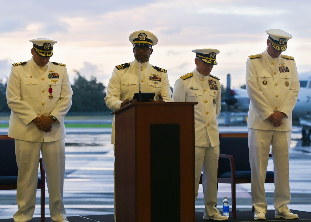 Lt. Cmdr. Phillip Ridley, Marine Corps Base Hawaii’s chaplain, concludes the Patrol Wing Squadron TWO’s disbandment ceremony with a prayer at Hangar 105 aboard Marine Corps Air Station Kaneohe Bay on May 24, 2017. After 80 years on Oahu, Wing TWO was disestablished and will be reassigned to Wing TEN stationed on Naval Air Station Whidbey Island, Washington. (U.S. Marine Corps photo by Cpl. Zachary Orr)