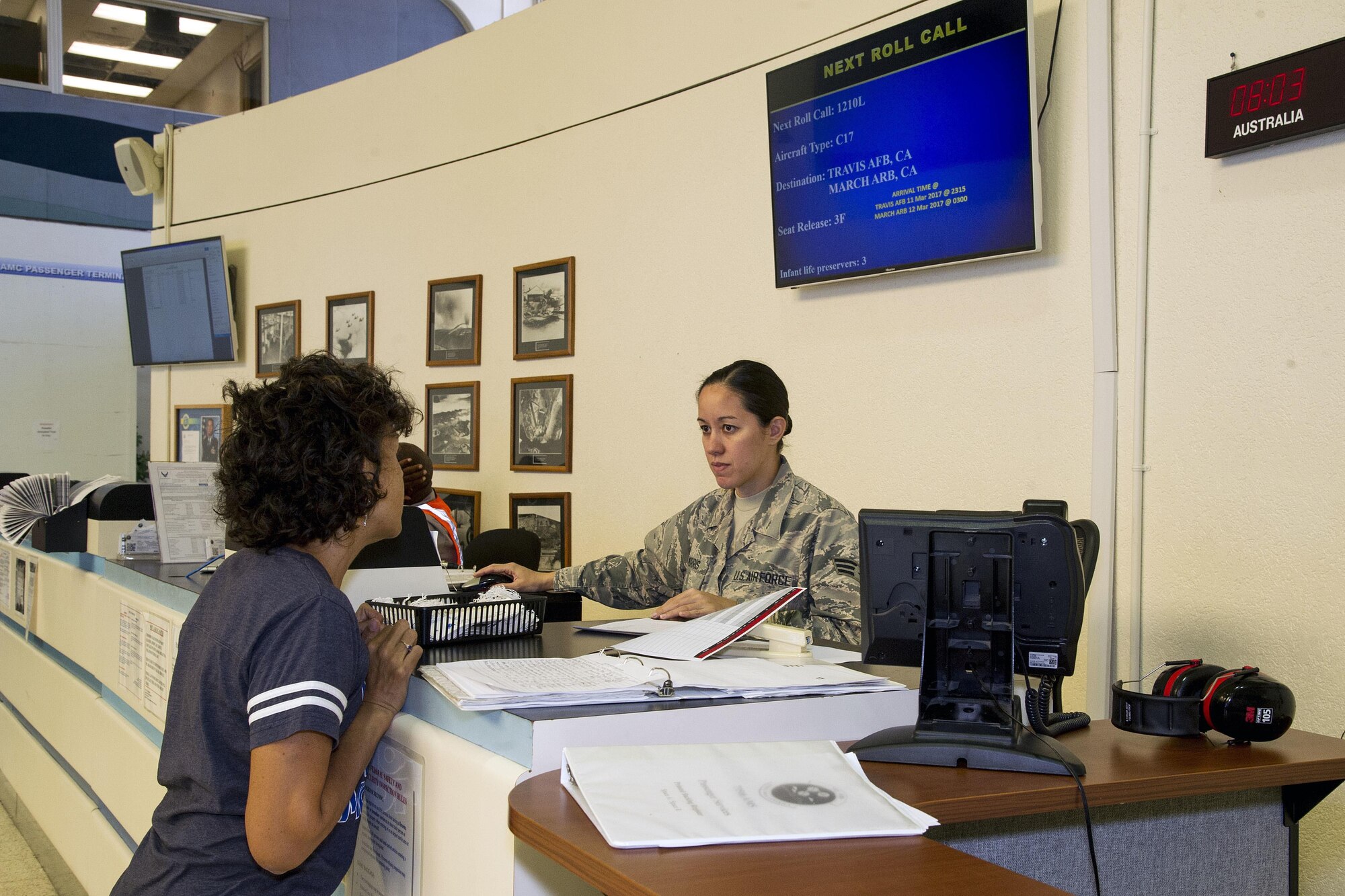 U.S. Air Force Senior Airman Jana Morris, an aerial transportation specialist with the 48th Aerial Port Squadron, checks-in a passenger awaiting a Space Available flight at Joint Base Pearl Harbor-Hickam, Hawaii, March 11, 2017. Members of the 48th Aerial Port Squadron support the Space A Travel program during their two-week annual training and monthly unit training assembly. Located on Oahu and a component of the Air Force Reserve, the 48th Aerial Port Squadron provides expertise in all areas of air terminal operations to include aircraft loading, cargo processing and inspecting, passenger services, aircraft fleet services and aerial port command and control. (U.S. Air Force photo by Master Sgt. Theanne K. Herrmann)